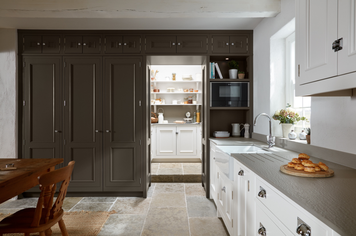 Georgian-style 1909 kitchen with floor to ceiling units and a walk-in pantry.