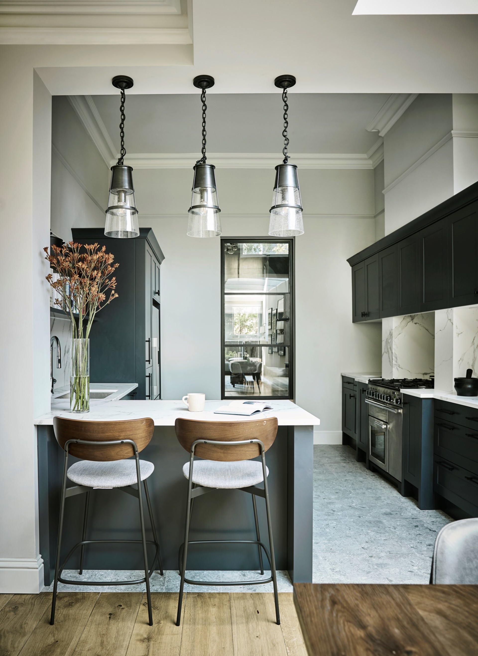 Shaker-style meets industrial chic in this modern kitchen